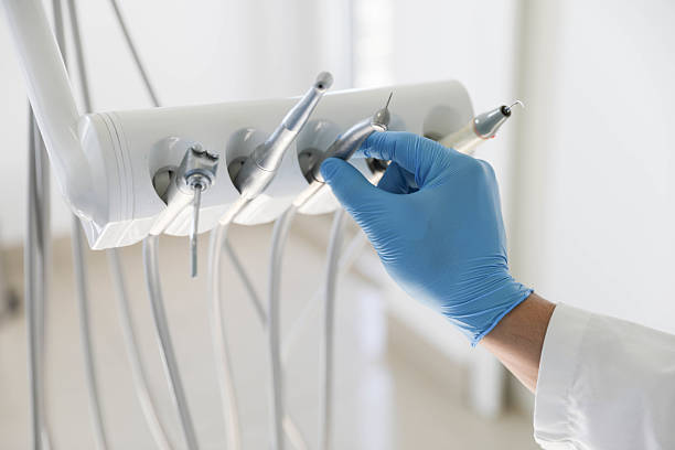 Professional Tooth Extraction technician working in Rockwell, AR